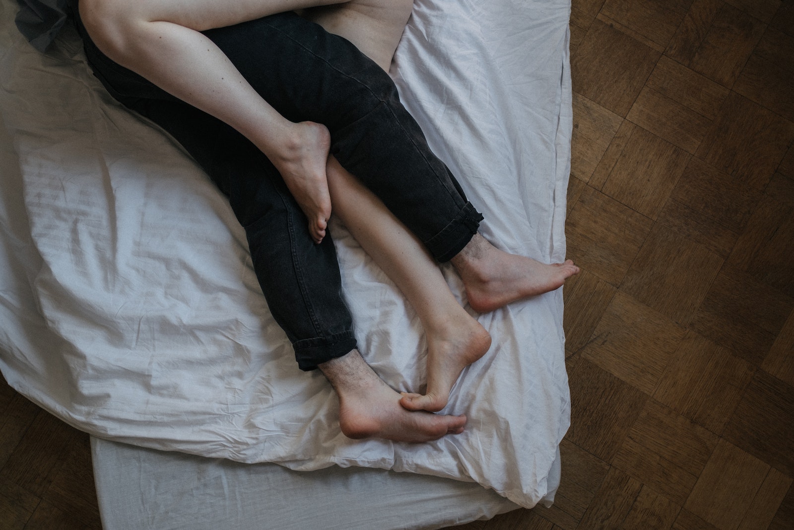 Free stock photo of adult, barefoot, bed